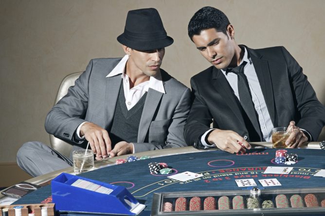 men playing poker